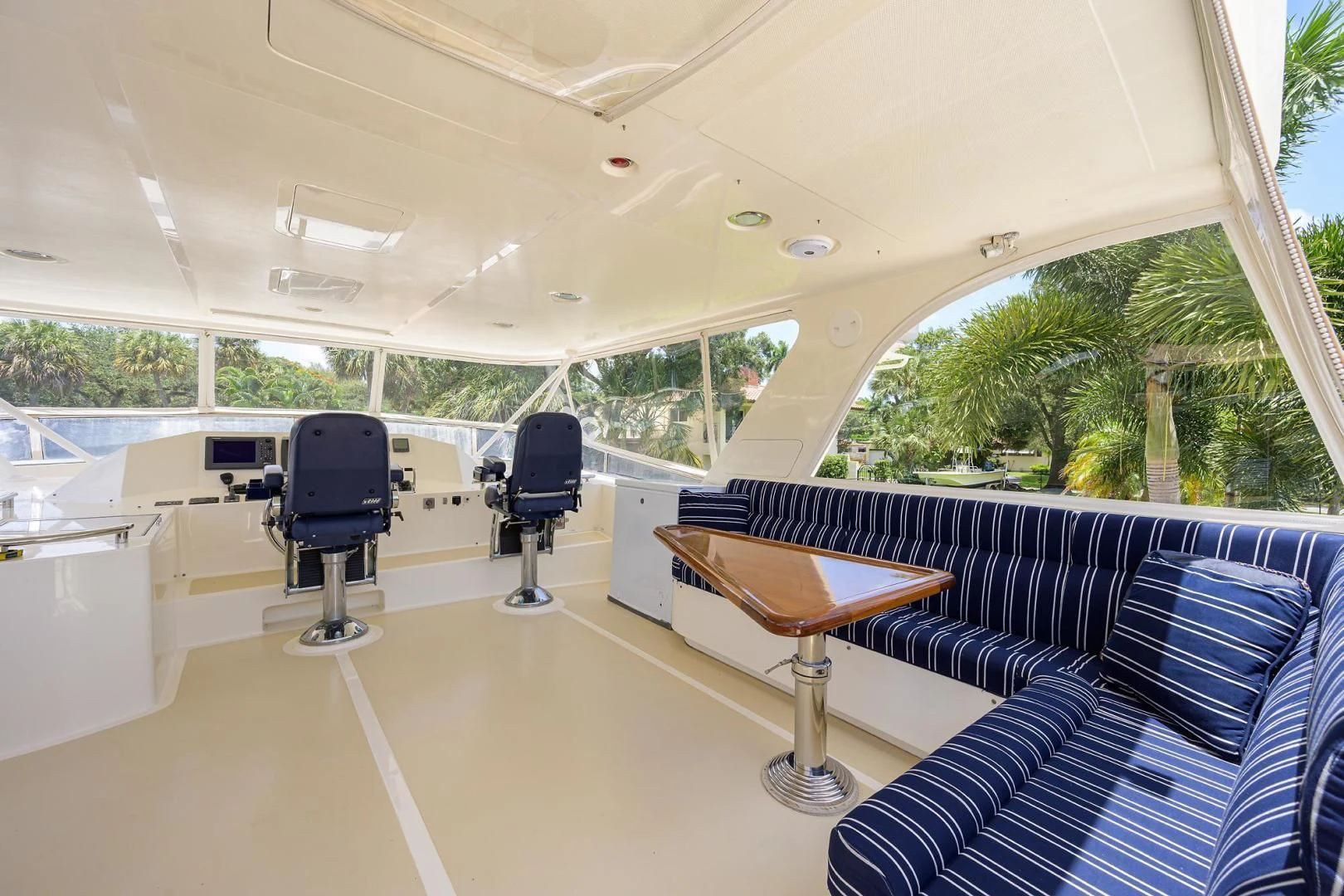 a room with a table and chairs aboard BELLA Yacht for Sale