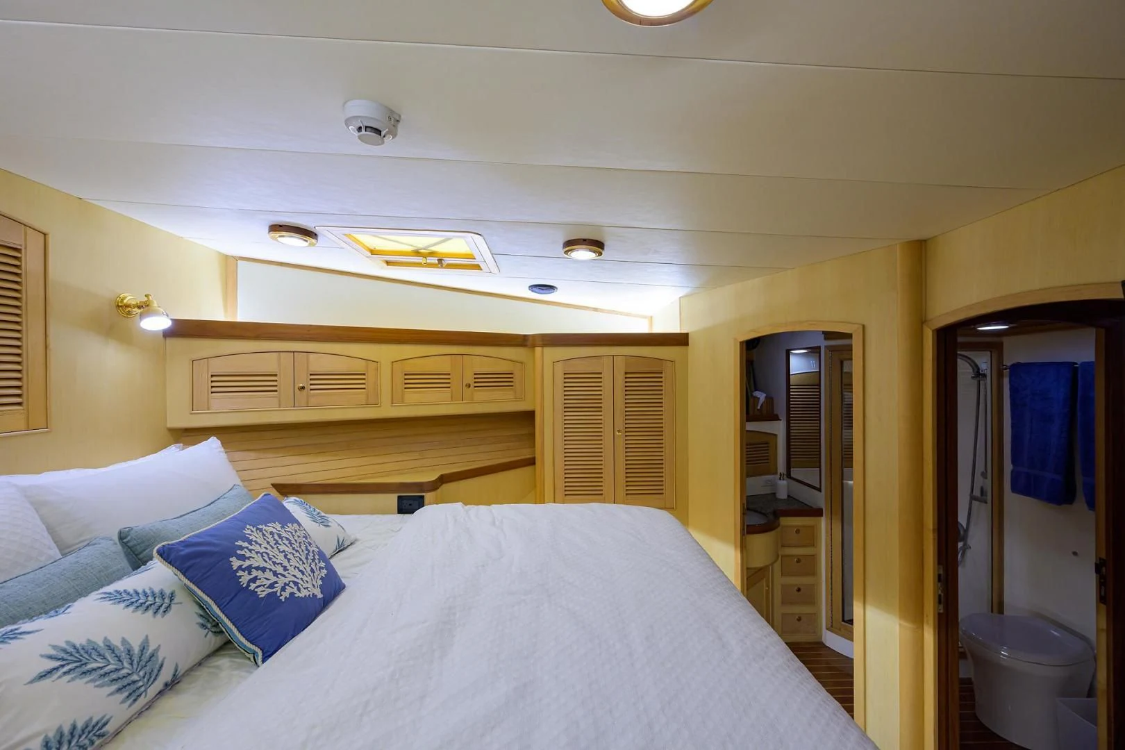 a bed in a room aboard BELLA Yacht for Sale