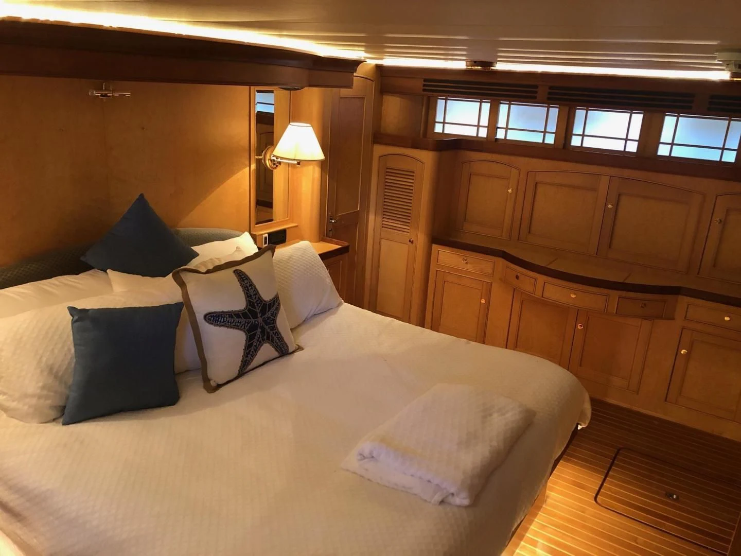 a bed with pillows and pillows aboard BELLA Yacht for Sale