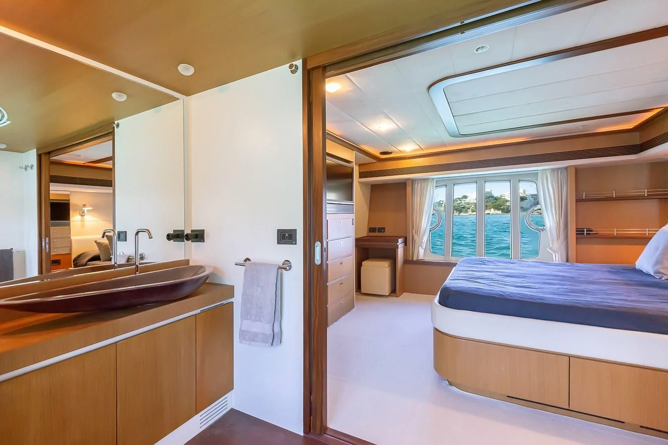 a room with a bed and a sink aboard BIJOU Yacht for Sale