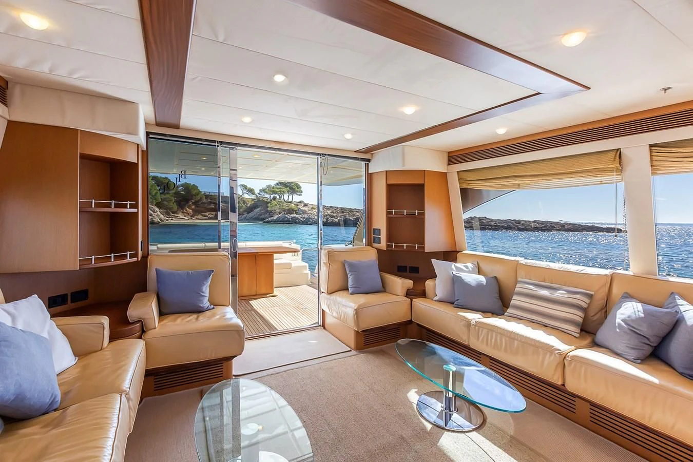 a living room with a large glass window aboard BIJOU Yacht for Sale