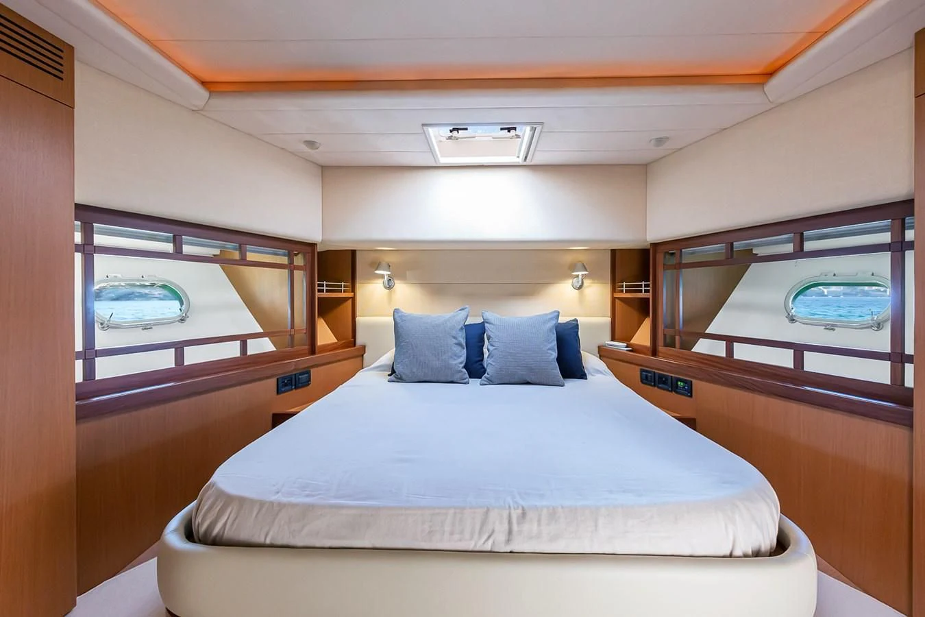 a room with a bed and a window aboard BIJOU Yacht for Sale
