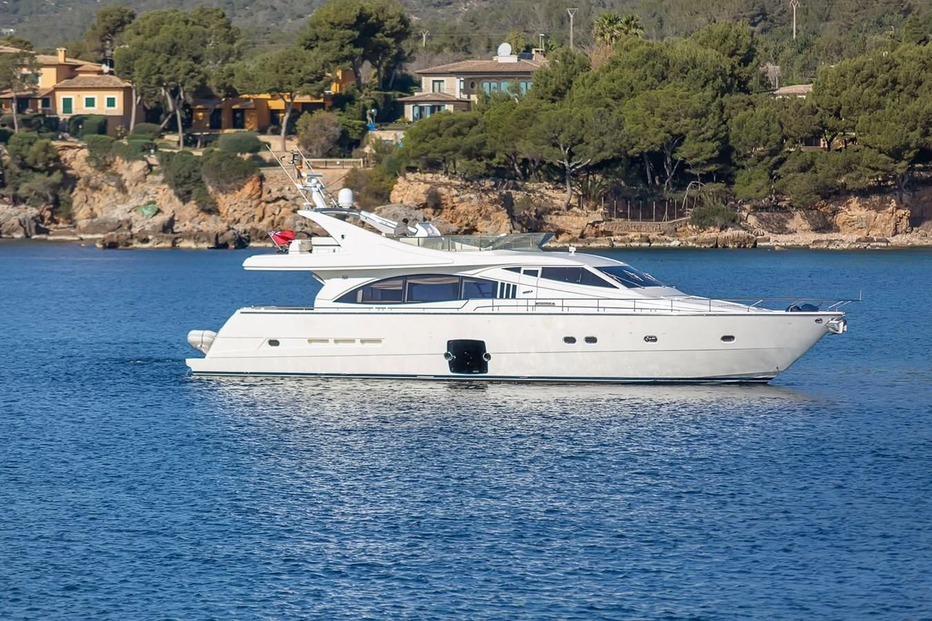 a white boat in the water aboard BIJOU Yacht for Sale