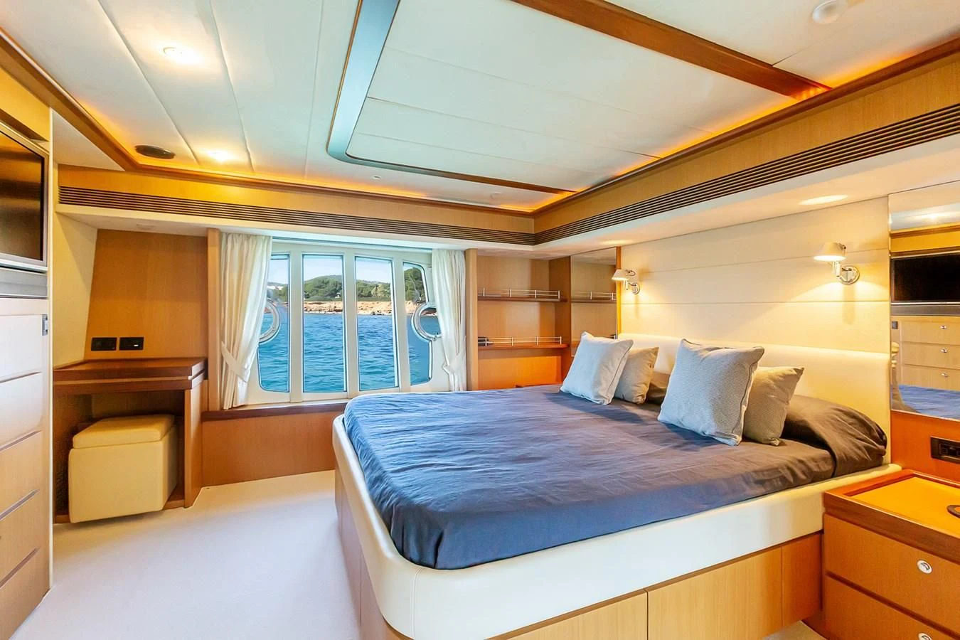 a large bedroom with a large bed aboard BIJOU Yacht for Sale