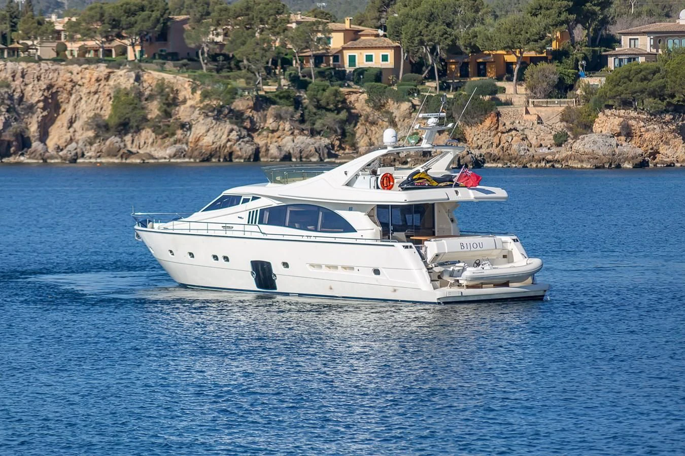 a white boat in the water aboard BIJOU Yacht for Sale