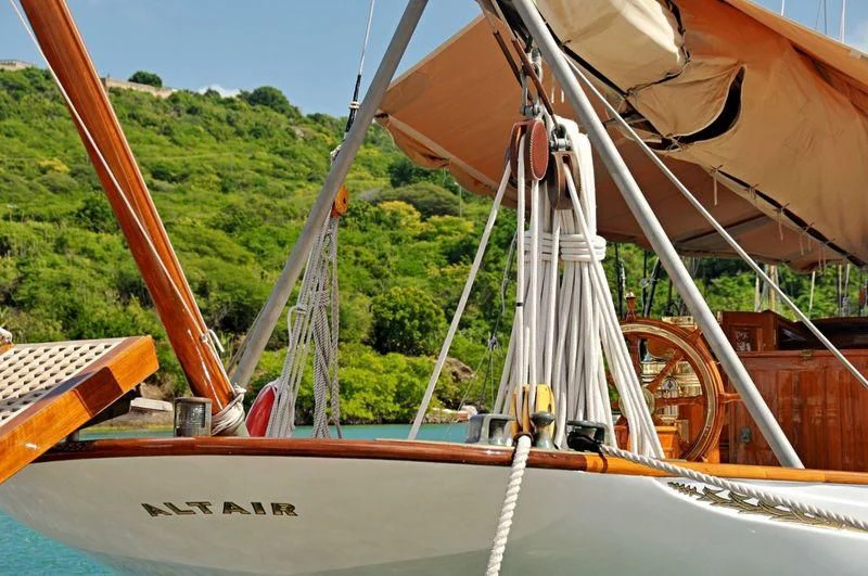 a boat with trees in the background aboard ALTAIR Yacht for Sale