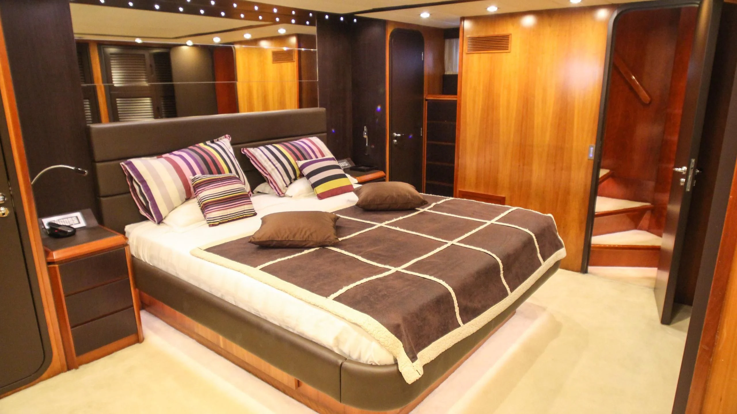 a bed in a room aboard CIRCUS Yacht for Sale