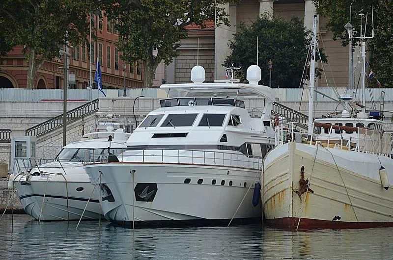 several boats docked in a harbor aboard CIRCUS Yacht for Sale