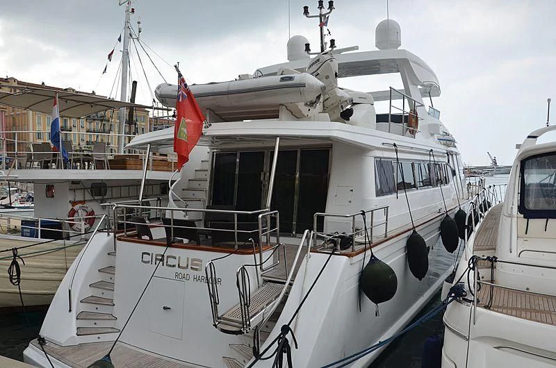 a boat docked at a pier aboard CIRCUS Yacht for Sale