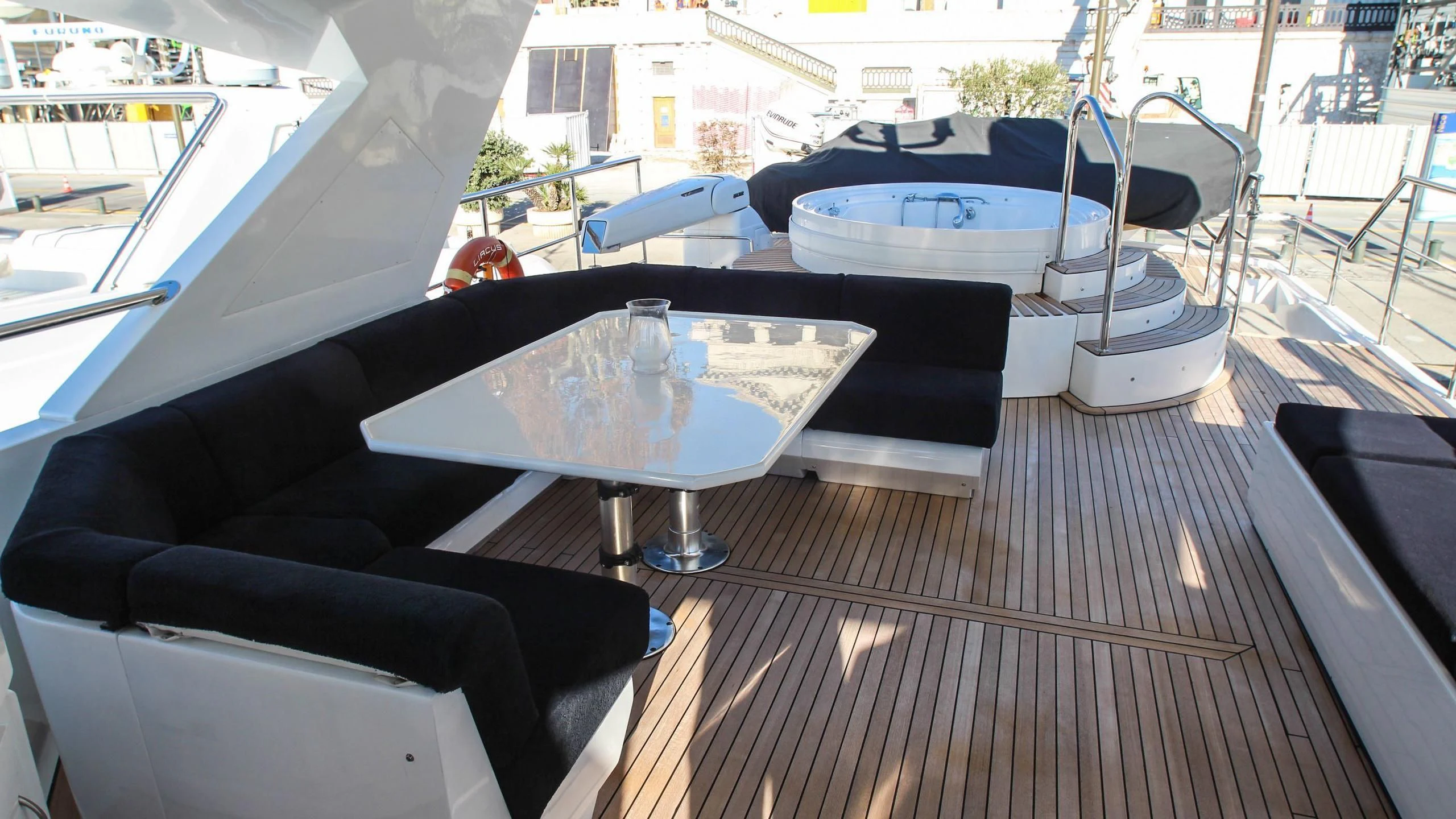 a table on a deck aboard CIRCUS Yacht for Sale
