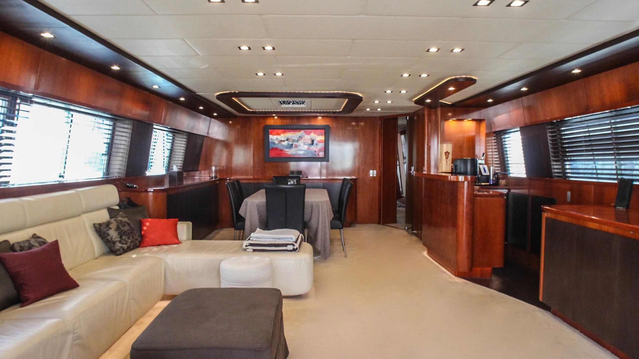 a room with a couch and a tv aboard CIRCUS Yacht for Sale