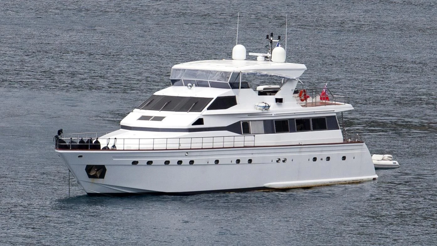 a white yacht in the water aboard CIRCUS Yacht for Sale