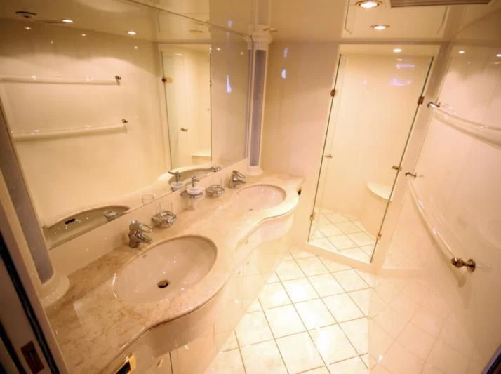 a bathroom with a sink and a shower aboard JOYS Yacht for Sale