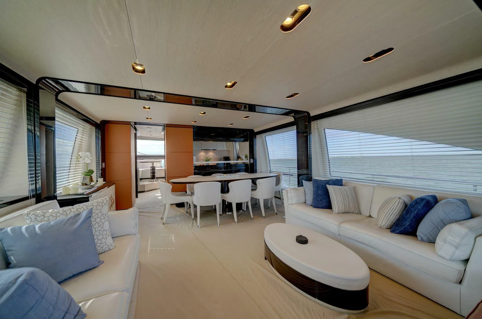 a living room with a large window aboard 80 AZIMUT Yacht for Sale