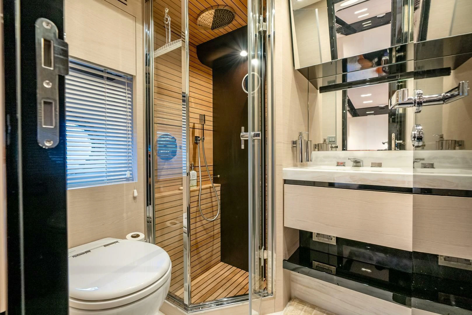 a bathroom with a glass shower aboard 80 AZIMUT Yacht for Sale