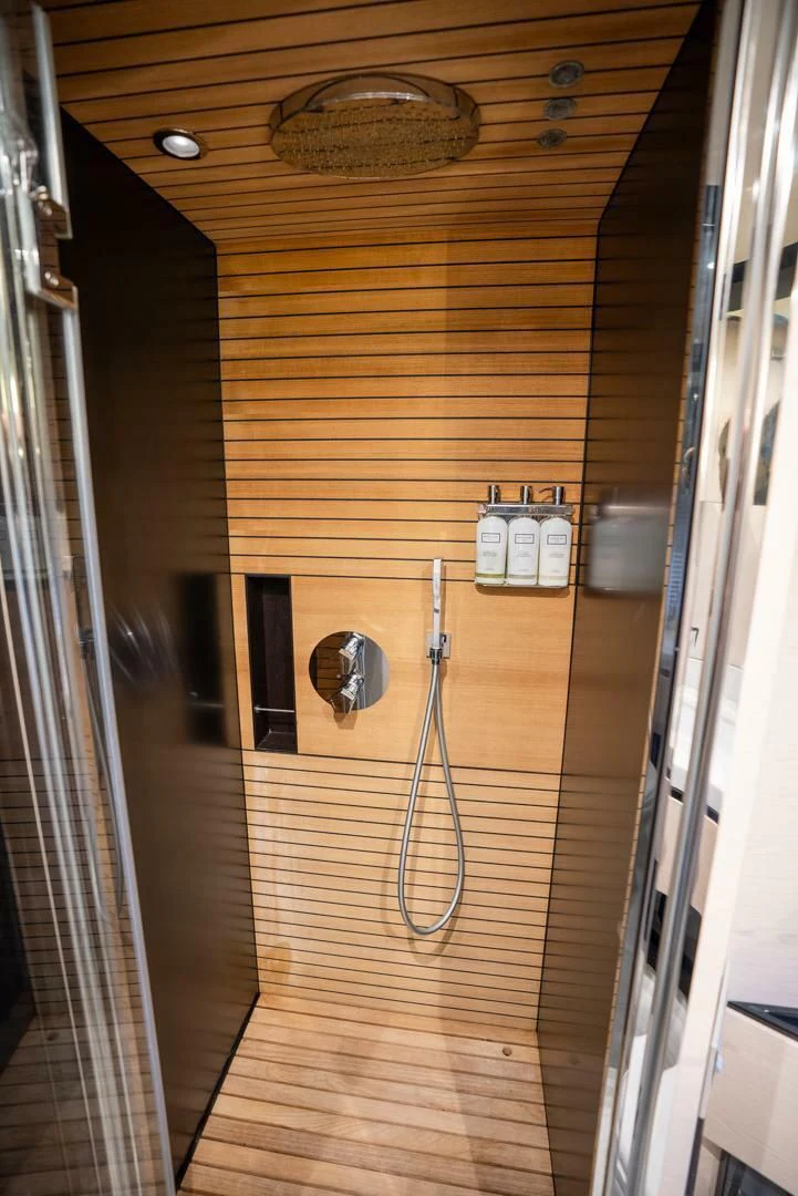 a wooden wall with a door aboard 80 AZIMUT Yacht for Sale
