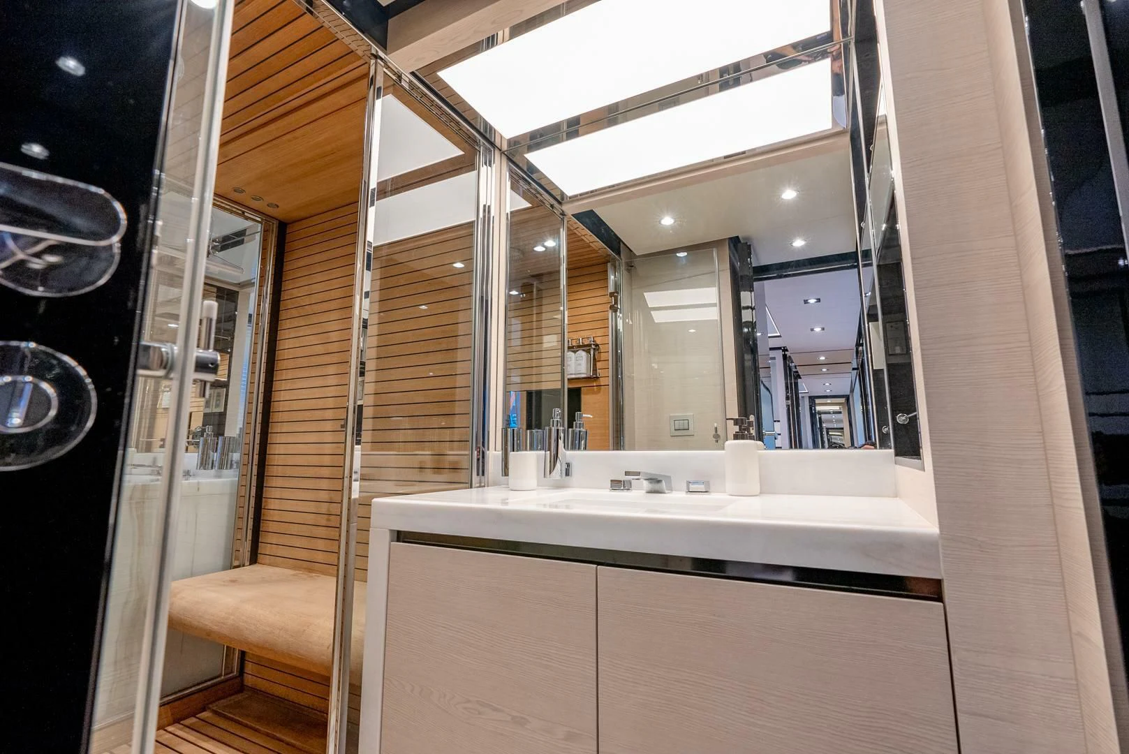 a bathroom with a large mirror aboard 80 AZIMUT Yacht for Sale