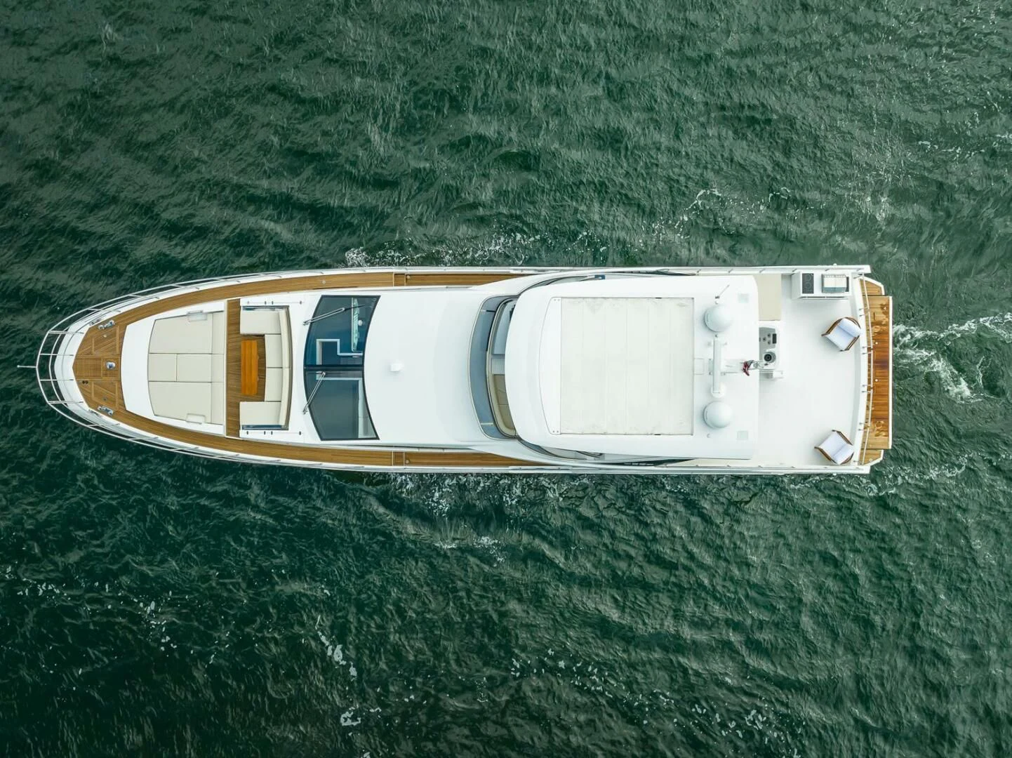 a white rectangular object on a green surface aboard 80 AZIMUT Yacht for Sale