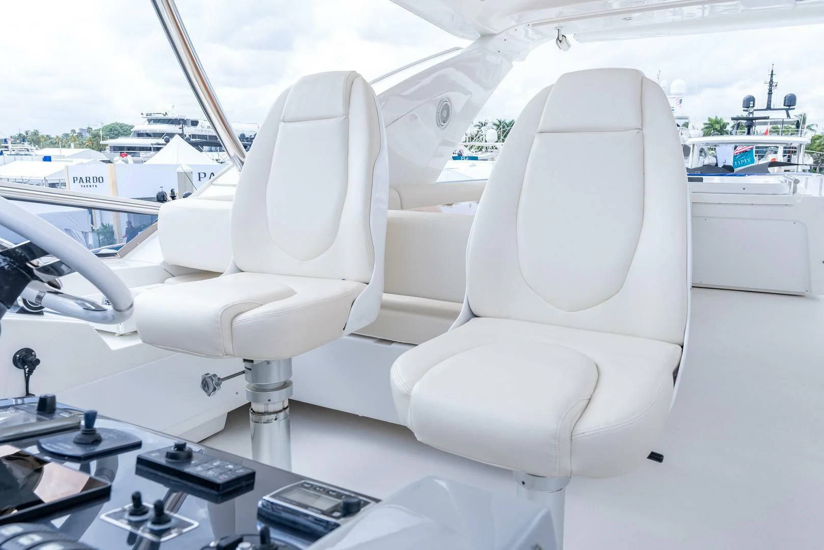 a white chair on a boat aboard 80 AZIMUT Yacht for Sale