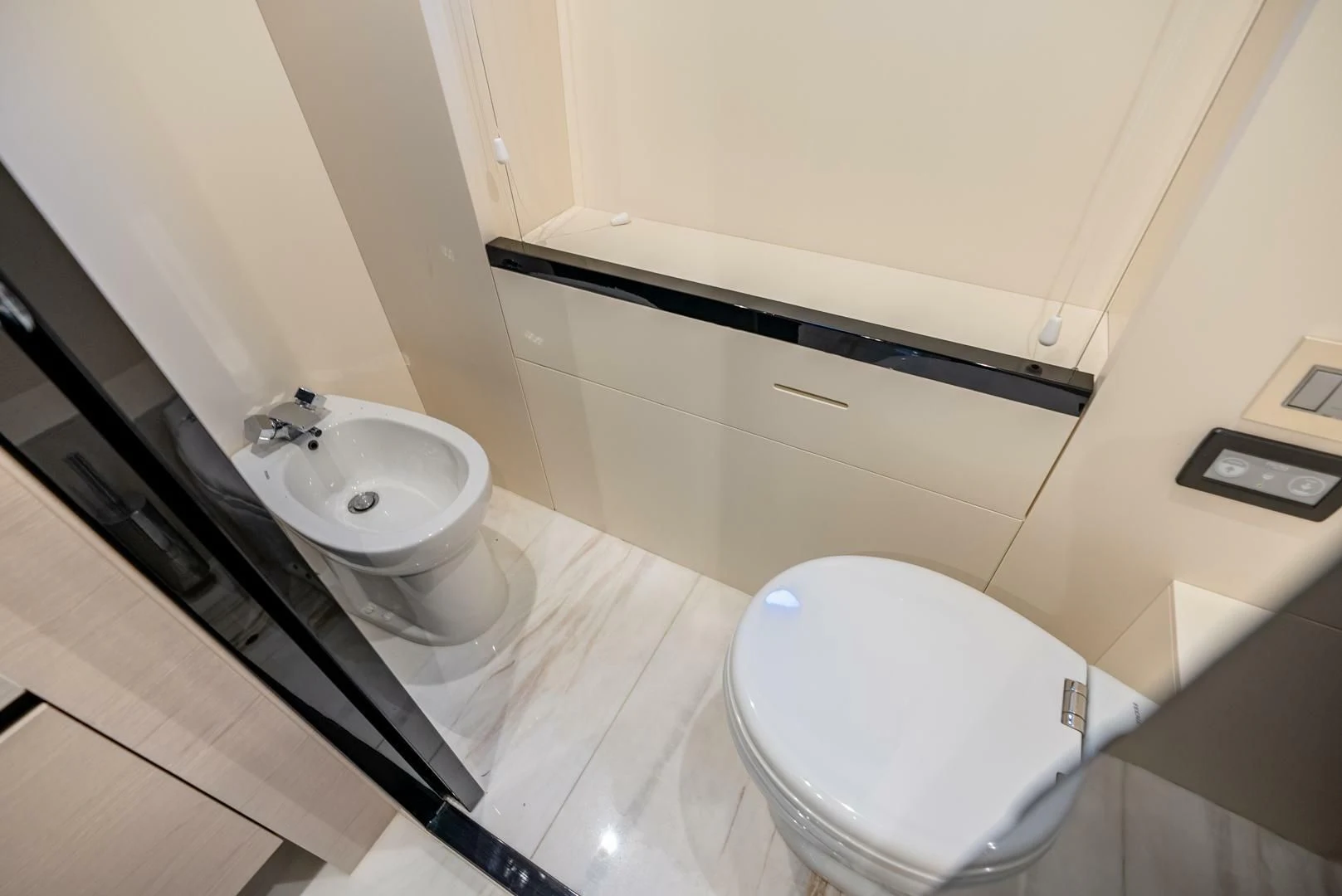 a bathroom with a sink and a toilet aboard 80 AZIMUT Yacht for Sale