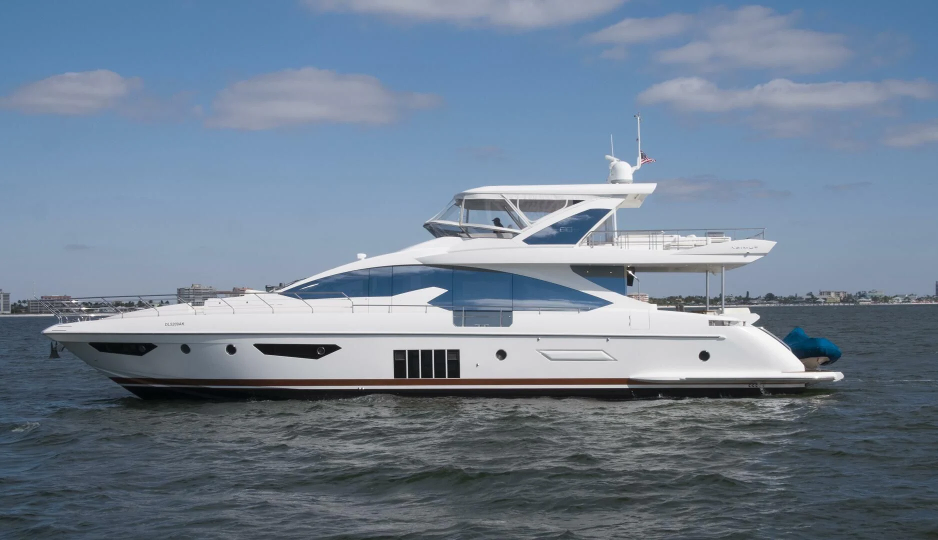 a white yacht on the water aboard 80 AZIMUT Yacht for Sale