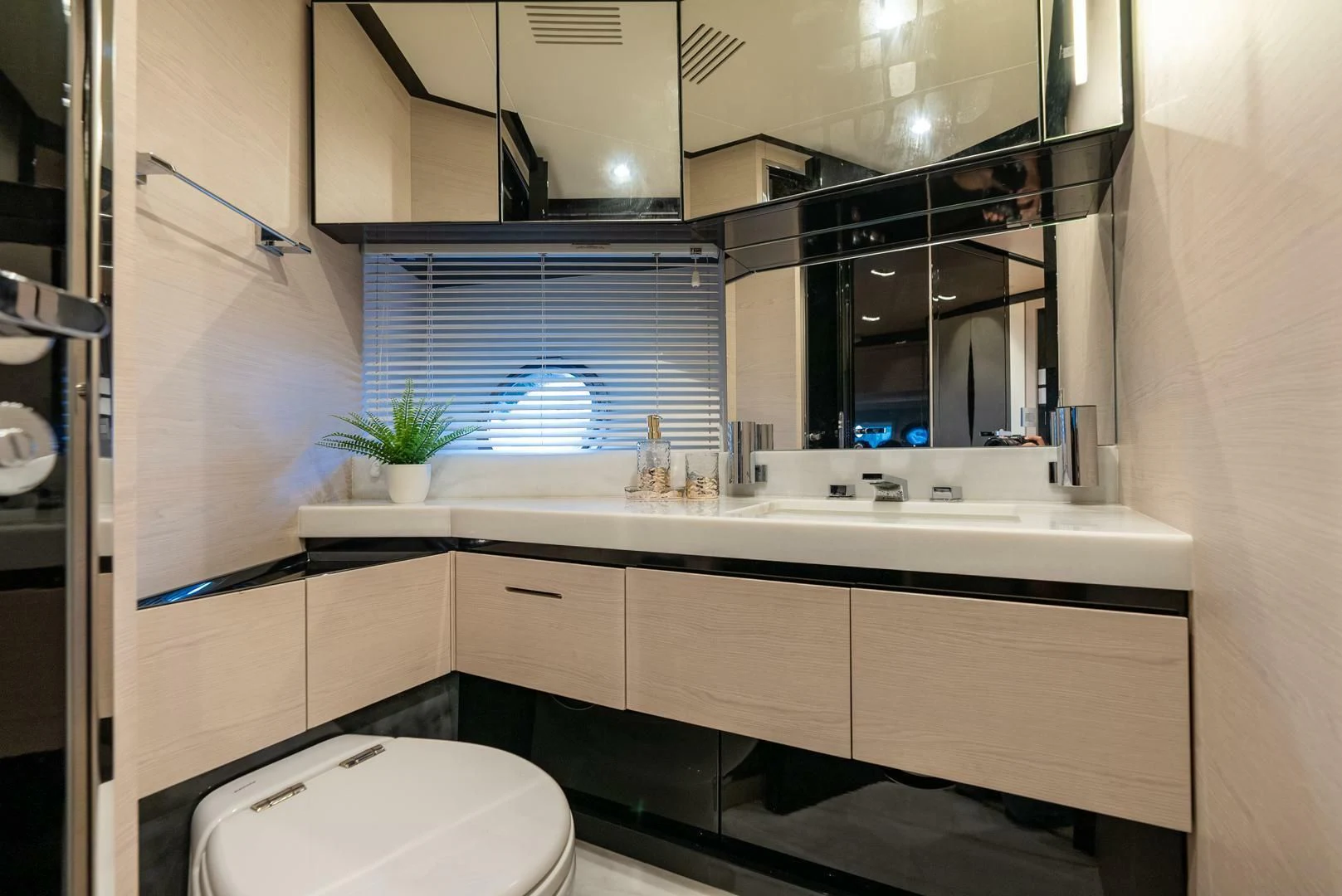 a bathroom with a sink and a toilet aboard 80 AZIMUT Yacht for Sale