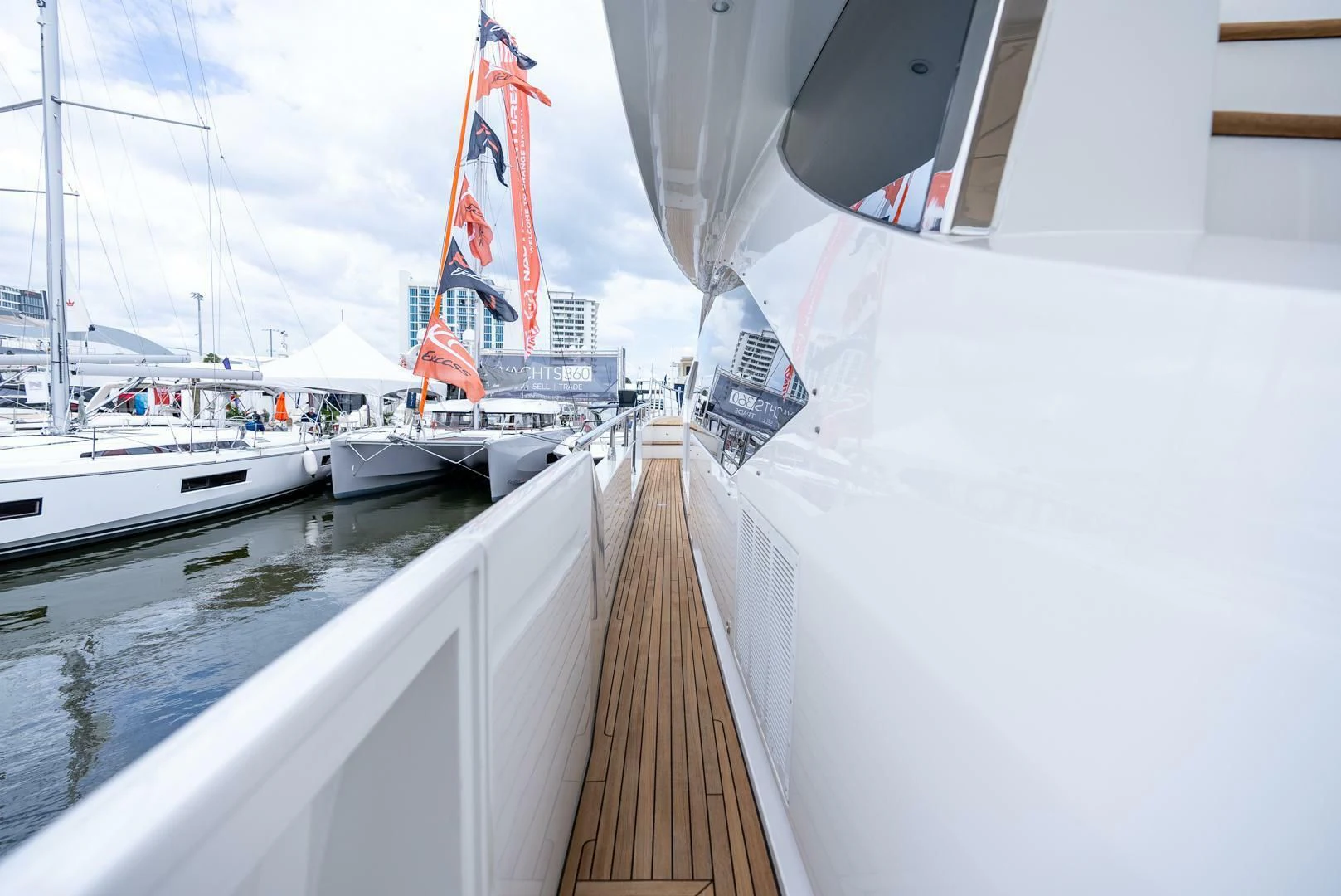 a boat with a sail on the deck aboard 80 AZIMUT Yacht for Sale