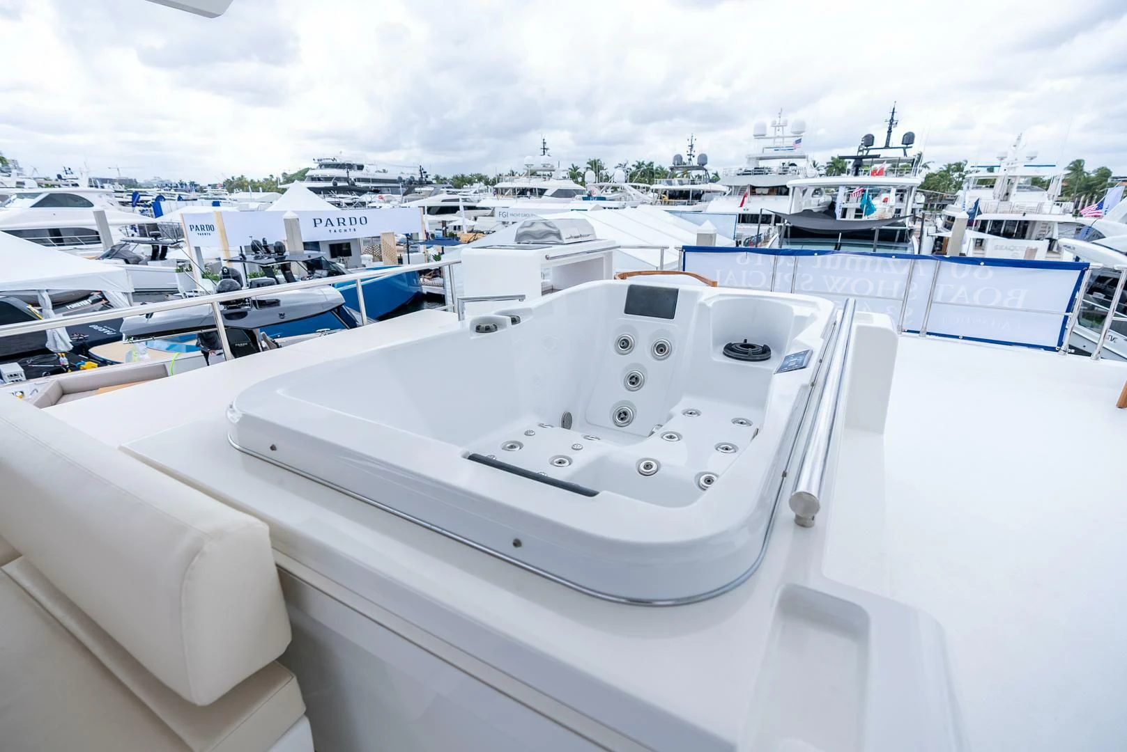 a white boat in a harbor aboard 80 AZIMUT Yacht for Sale