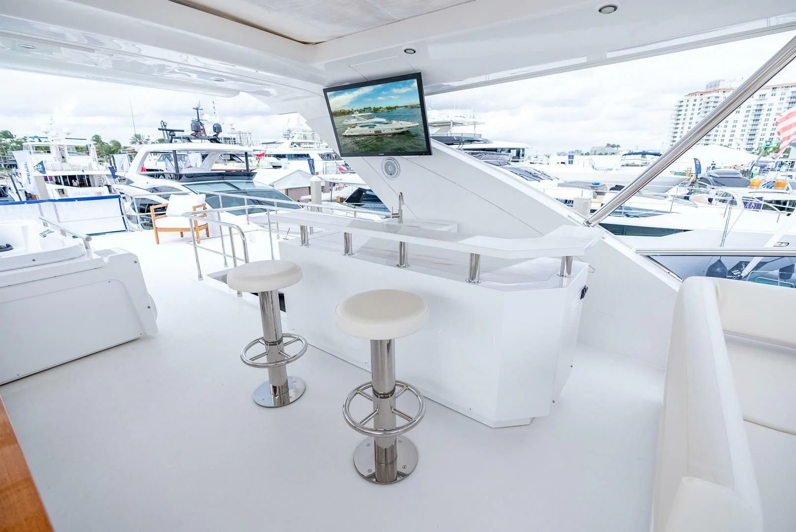a room with a table and chairs aboard 80 AZIMUT Yacht for Sale