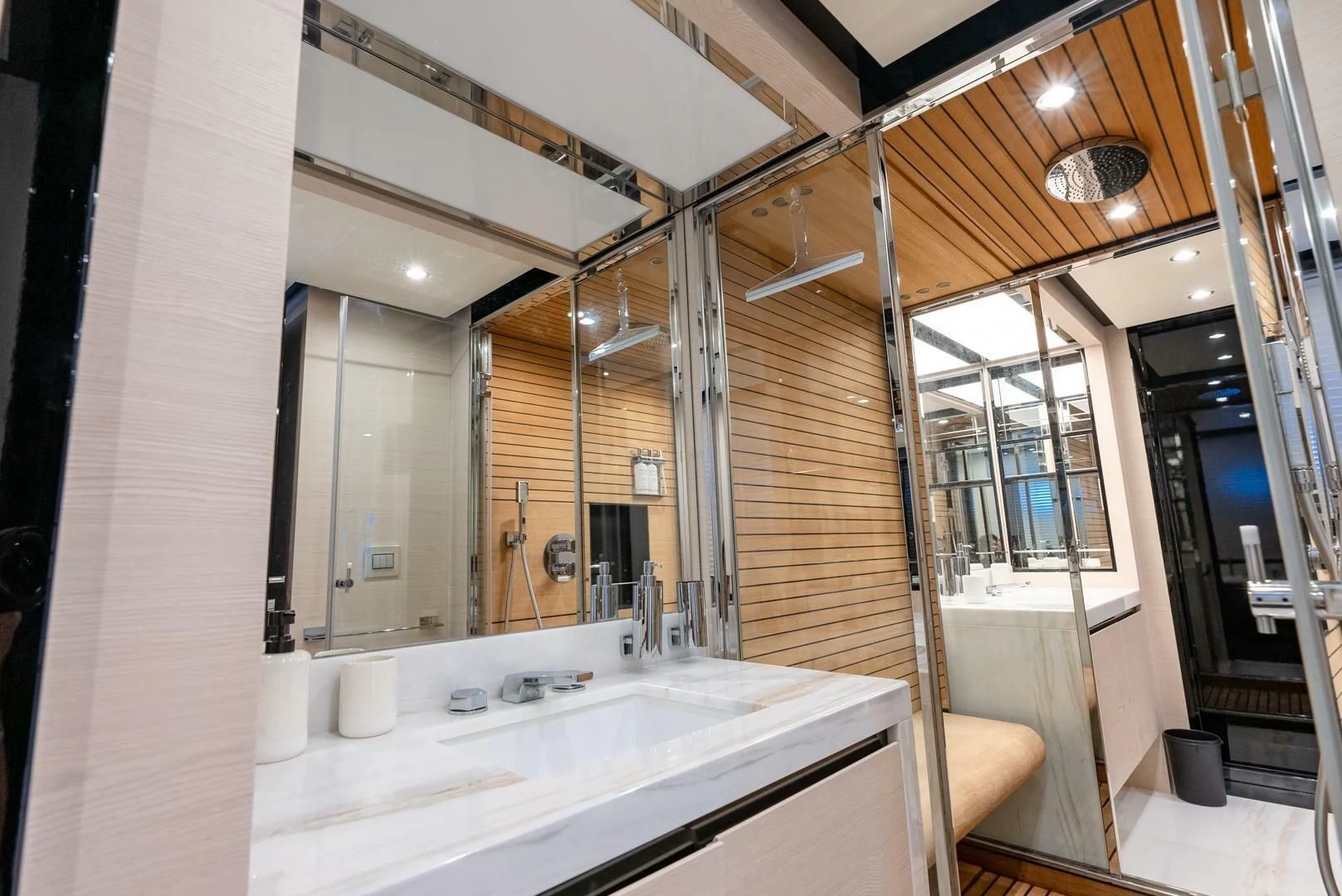 a bathroom with a large mirror aboard 80 AZIMUT Yacht for Sale