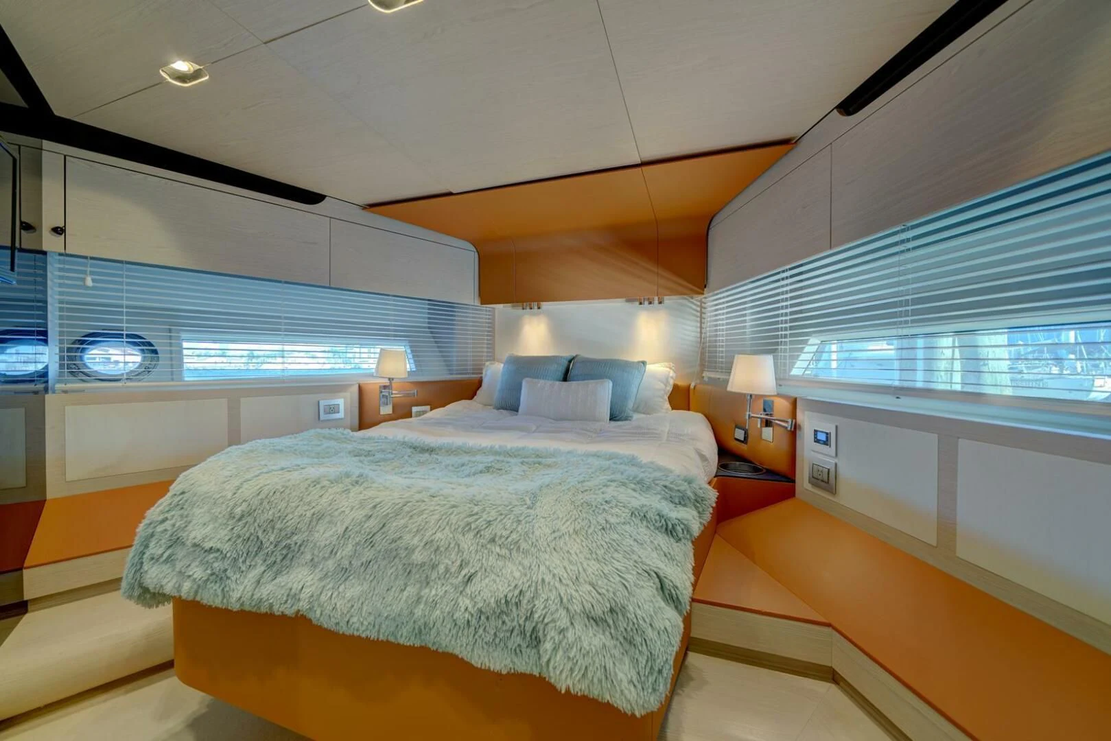 a bedroom with a bed and a window aboard 80 AZIMUT Yacht for Sale