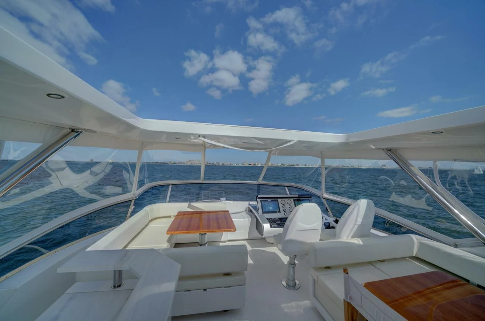 a boat with a laptop on the deck aboard 80 AZIMUT Yacht for Sale