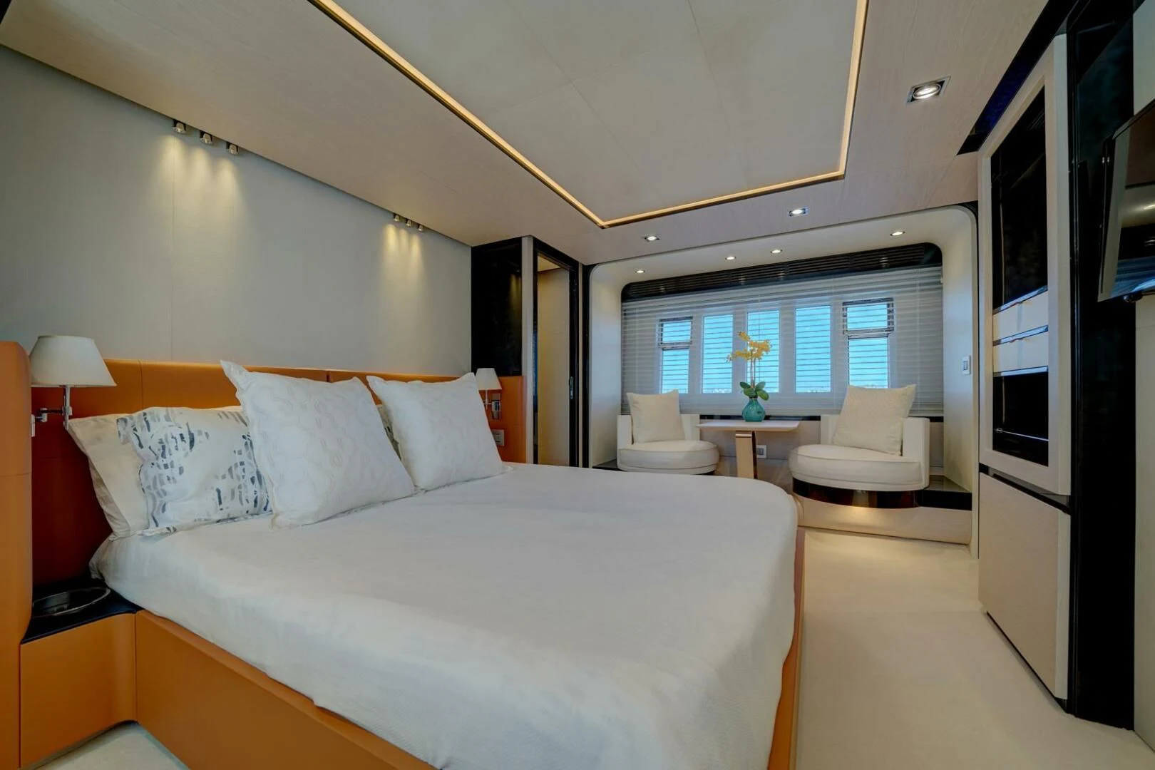 a large bed in a room aboard 80 AZIMUT Yacht for Sale