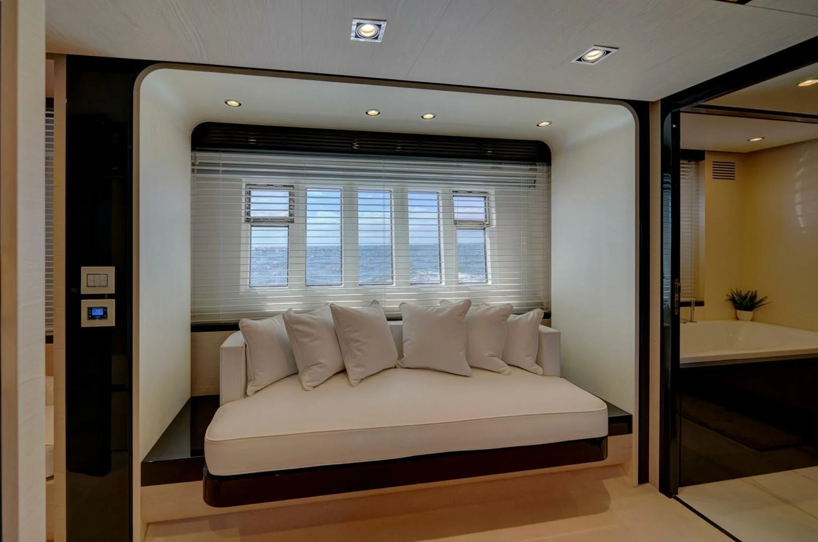 a large white bed in a room aboard 80 AZIMUT Yacht for Sale