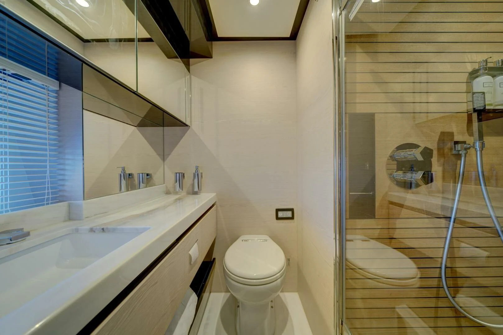 a bathroom with a glass shower aboard 80 AZIMUT Yacht for Sale