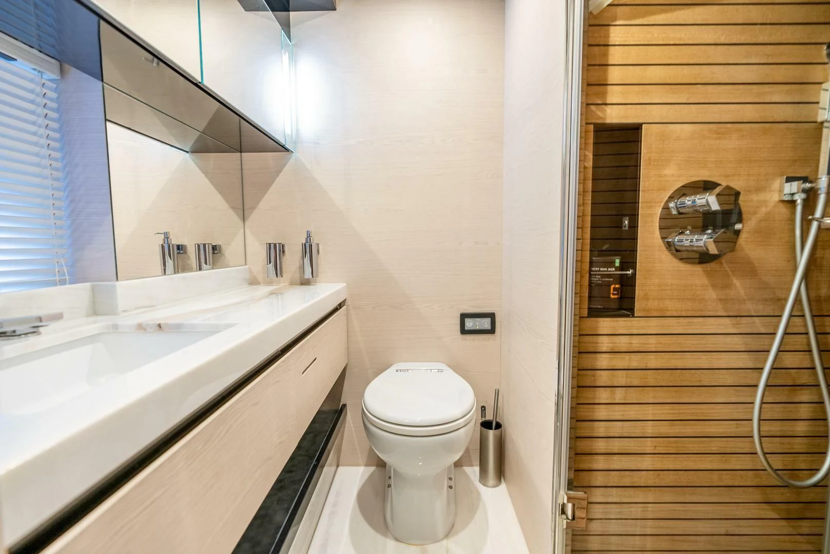 a bathroom with a toilet and sink aboard 80 AZIMUT Yacht for Sale