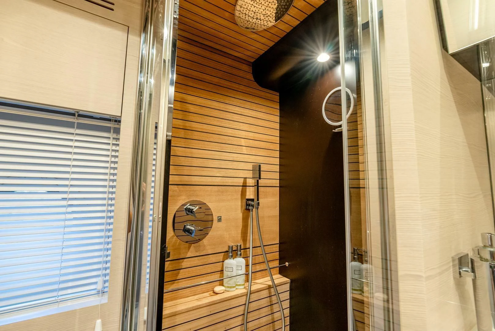 a shower unit with a mirror aboard 80 AZIMUT Yacht for Sale