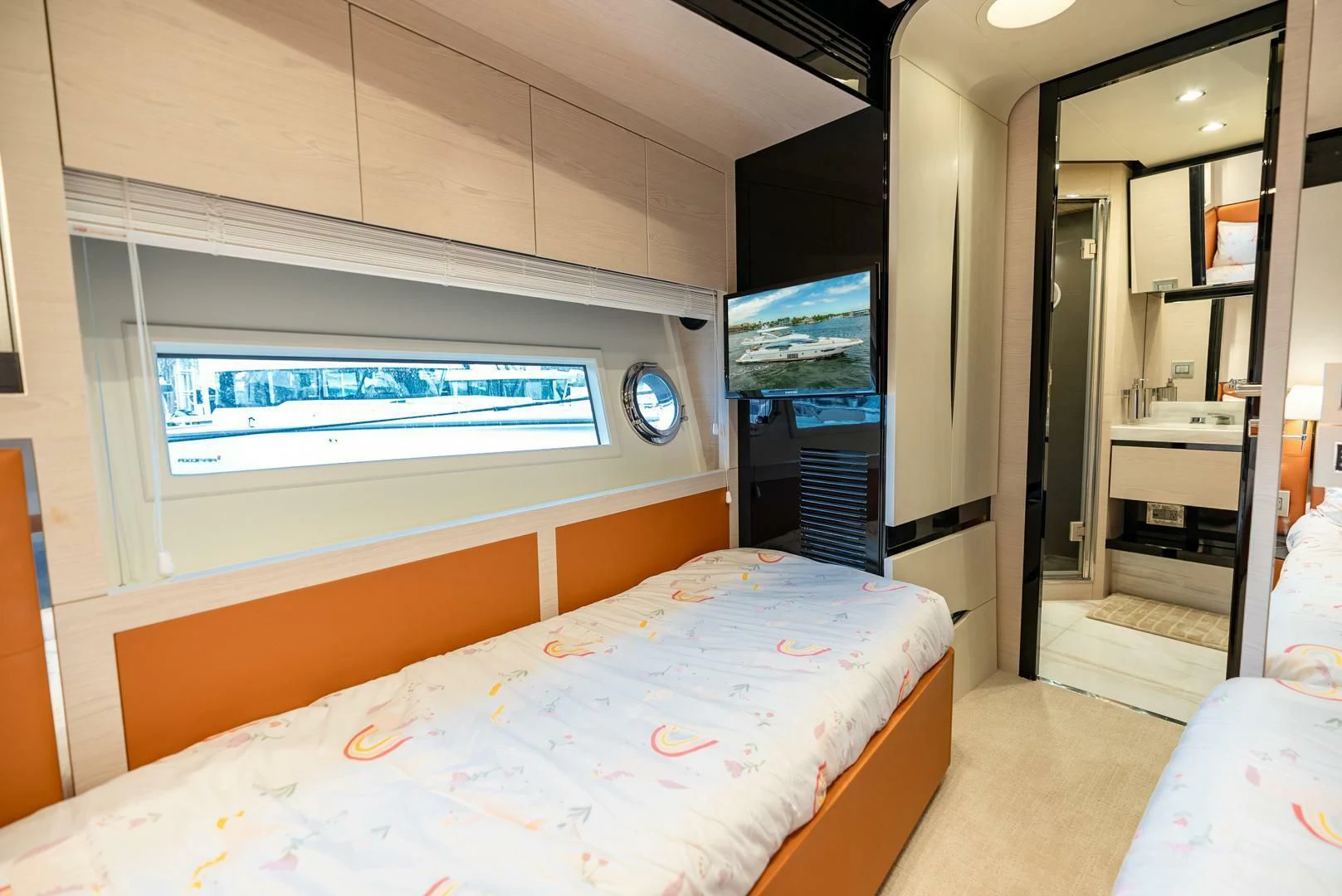 a room with a bed and a tv aboard 80 AZIMUT Yacht for Sale