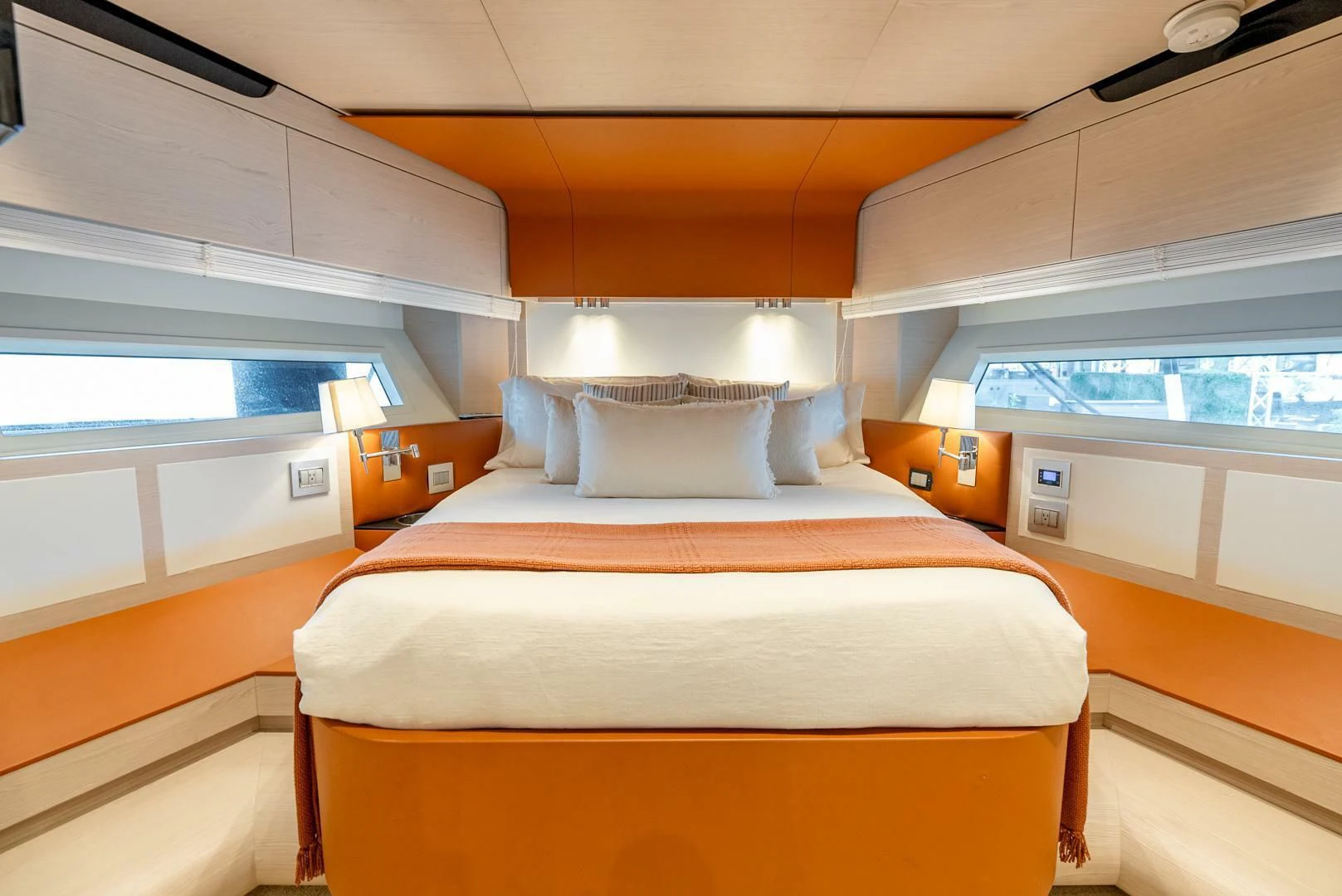 a room with a bed and a window aboard 80 AZIMUT Yacht for Sale