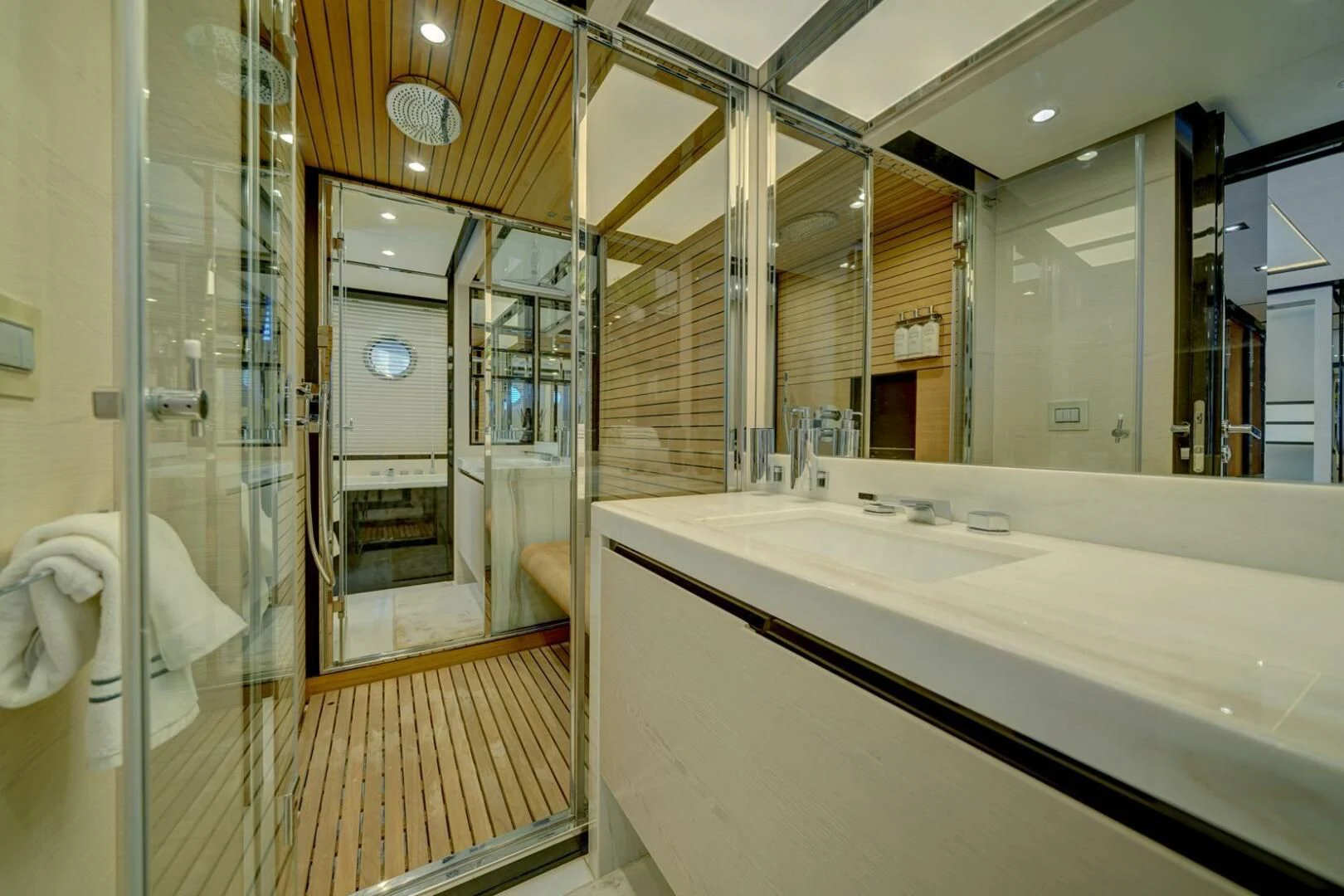 a bathroom with a large mirror aboard 80 AZIMUT Yacht for Sale