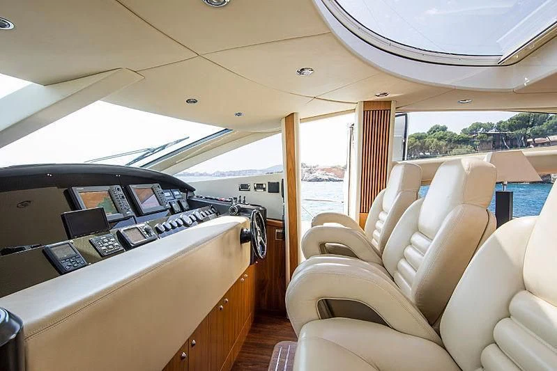 inside of a car aboard INFINITO Yacht for Sale
