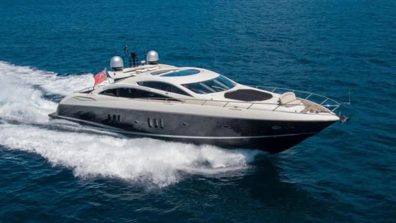 a white yacht on the water aboard INFINITO Yacht for Sale