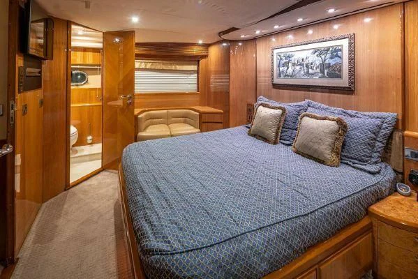 a bed in a room aboard APOLLO Yacht for Sale