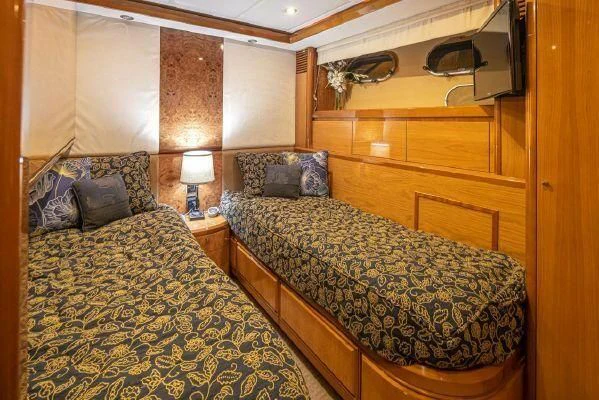 a couple of beds in a hotel room aboard APOLLO Yacht for Sale