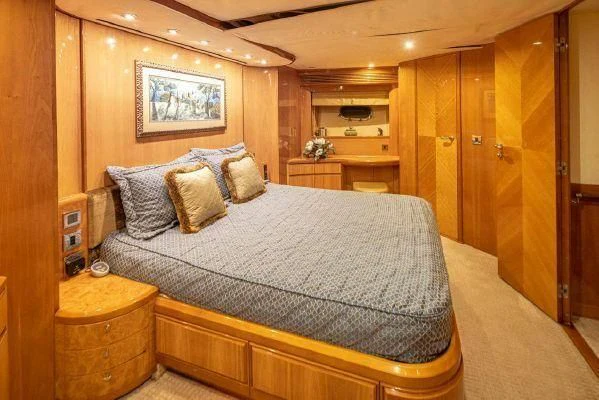 a bed in a room aboard APOLLO Yacht for Sale