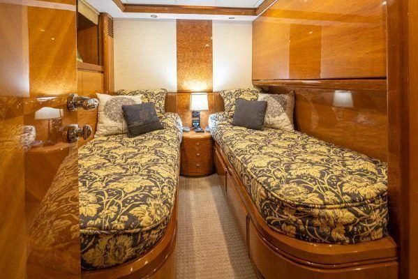 a room with two beds aboard APOLLO Yacht for Sale