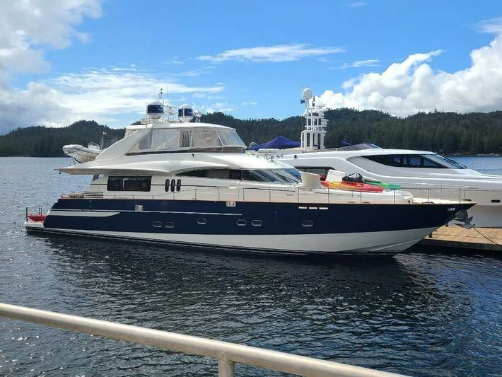 a large boat on the water aboard APOLLO Yacht for Sale