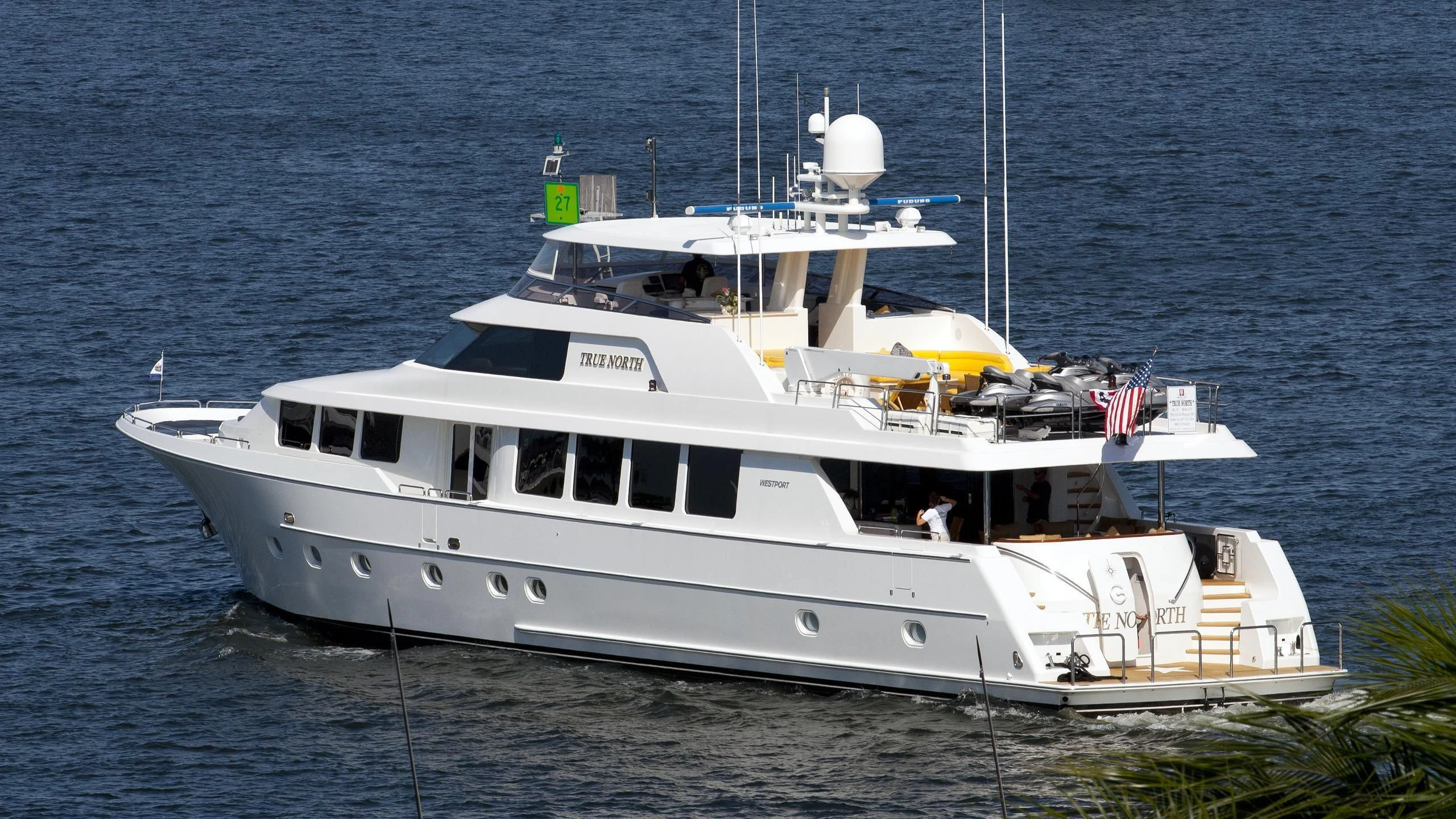 a white boat on the water aboard LA LADY Yacht for Sale