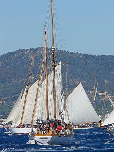 a group of people sailing on a boat aboard LE DON DU VENT Yacht for Sale