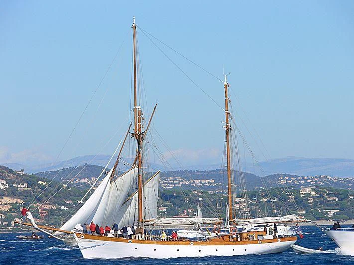 a boat with a mast aboard LE DON DU VENT Yacht for Sale